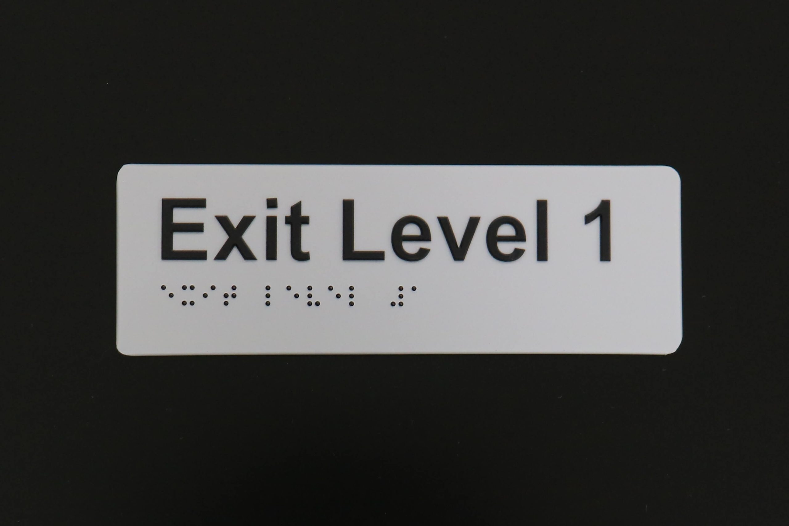 Indoor Braille exit sign